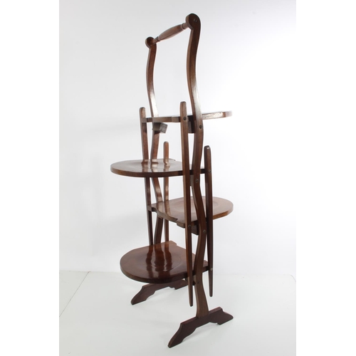 203 - An antique mahogany folding cakestand.