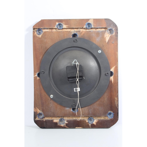 207 - An unusual wall clock with brass cartridge shell cases.