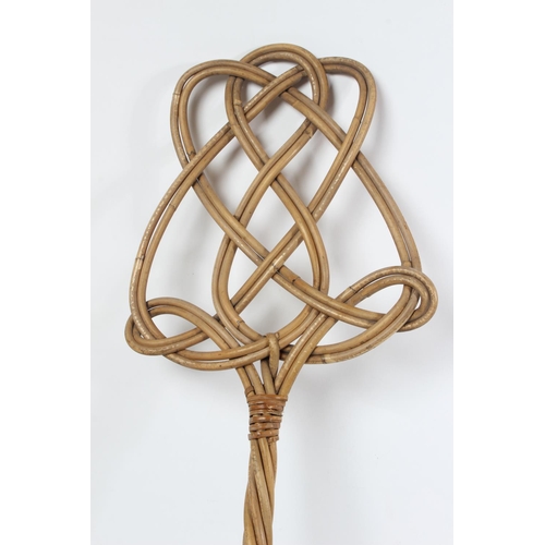 219 - A vintage carpet beater.