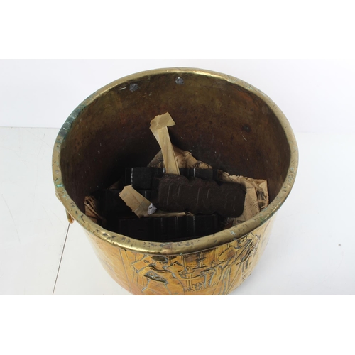 236 - A stunning large antique brass coal bucket with lion mask handles.