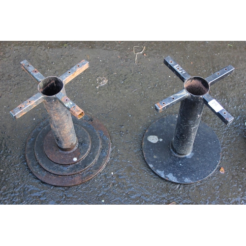 25 - A pair of metal table / stool bases.