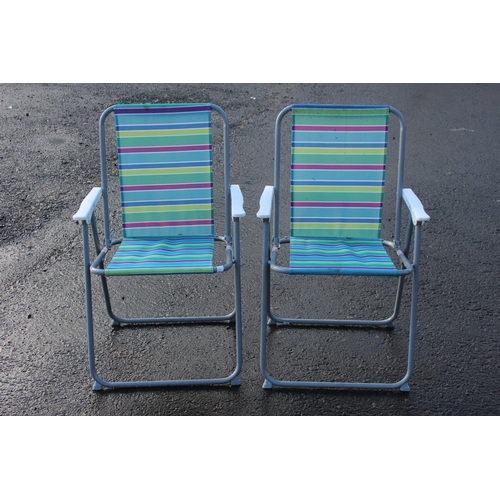 29 - Two folding deck chairs.