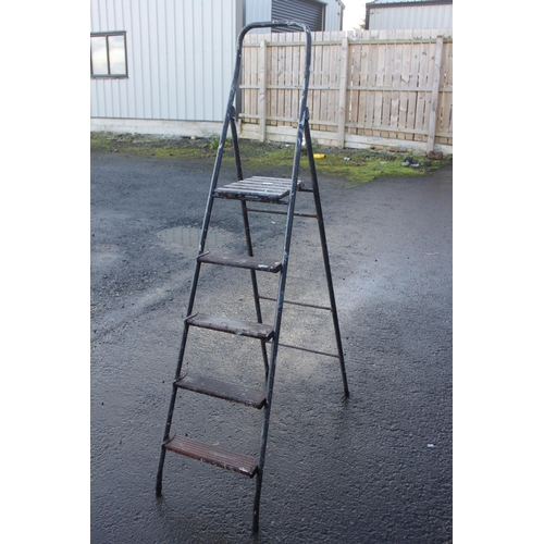 31 - A vintage metal framed step-ladder.