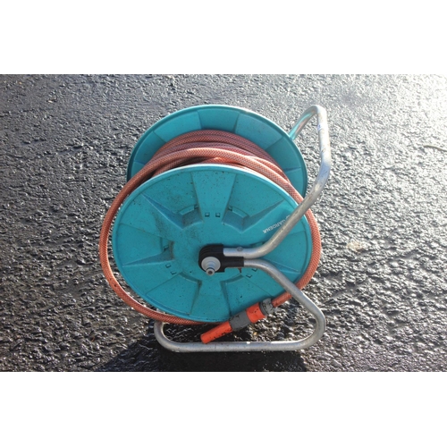 41 - A Gardena hose reel.