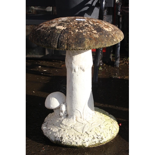 46 - A decorative garden ornament / statue in the form of a mushroom, height 20