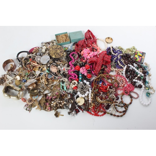 73 - A large lot of assorted costume jewellery and more.