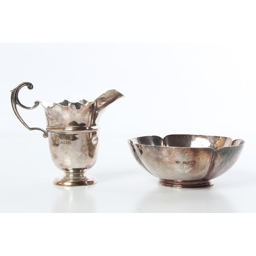 91 - A stunning Sterling Silver milk jug and a Sterling Silver Art Deco style beaten bowl, weighing 136.3... 