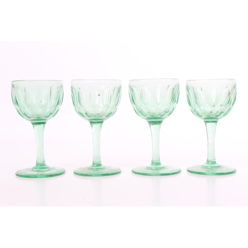 93 - A set of four vintage uranium liqueur glasses.