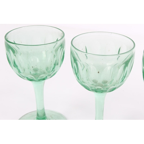 93 - A set of four vintage uranium liqueur glasses.