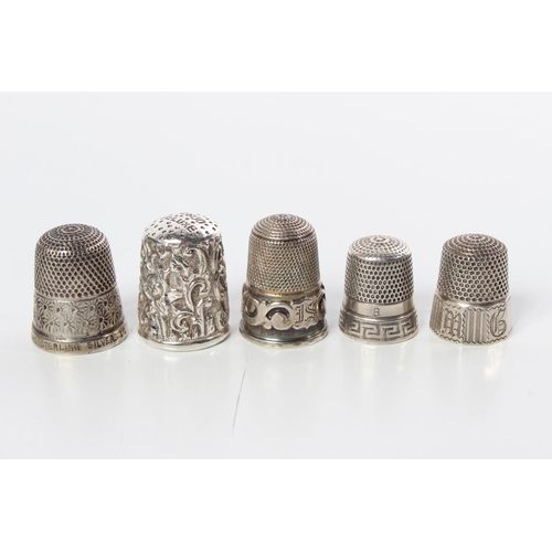 104 - Five Sterling Silver thimbles, one decorated on top 'PE 800 Deluxe'.