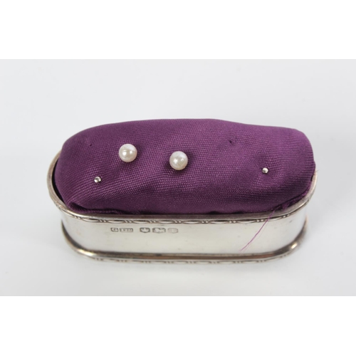 106 - A stunning Sterling Silver pin cushion.