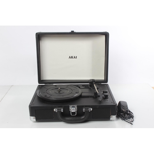 115 - An Akai record player with built in speakers.