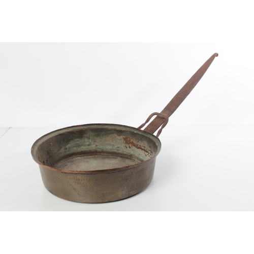 120 - An antique copper pan.