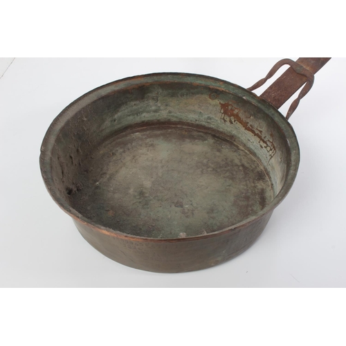 120 - An antique copper pan.