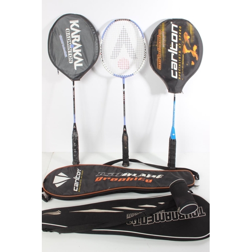 123 - Two sets of Badminton rackets and cases.