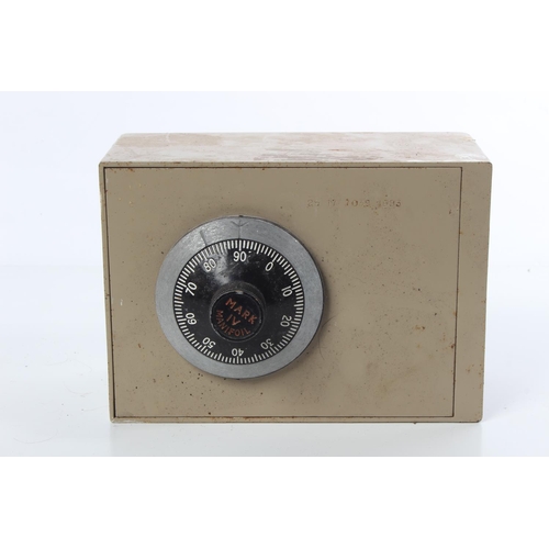 136 - A vintage miniature safe (no code).