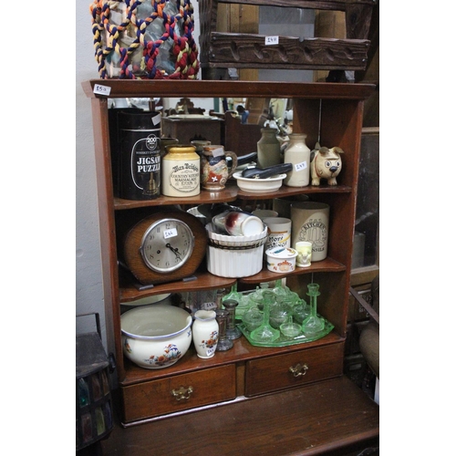 150 - An antique mahogany bookcase with mirror back and two drawers.