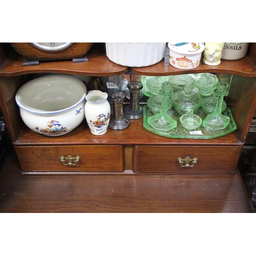 150 - An antique mahogany bookcase with mirror back and two drawers.