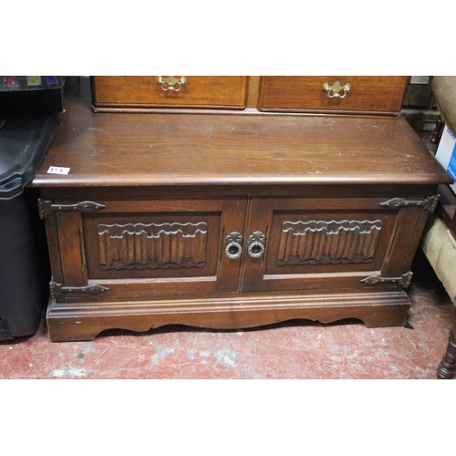 151 - A vintage oak Old Charm two door cabinet.