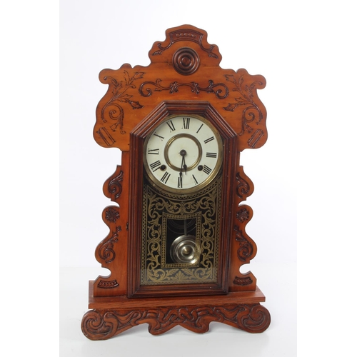 168 - An antique Gingerbread clock.