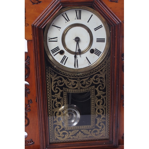 168 - An antique Gingerbread clock.