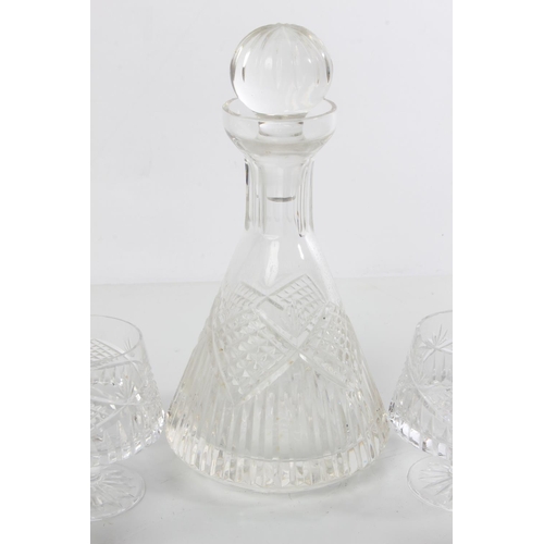 169 - A cut glass decanter and four brandy glass.