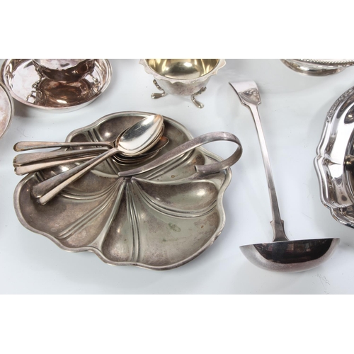 173 - A large lot of silver plated ware.