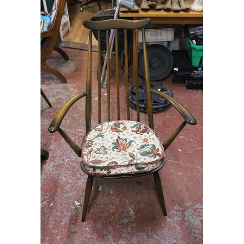 175 - A stunning vintage Ercol dining room table and six chair set.