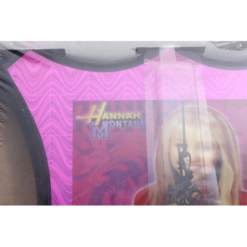 184 - Two unopen boxed Hannah Montana clocks.