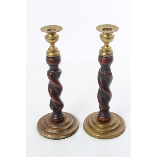 187 - A pair of vintage metal and oak turned candlesticks.