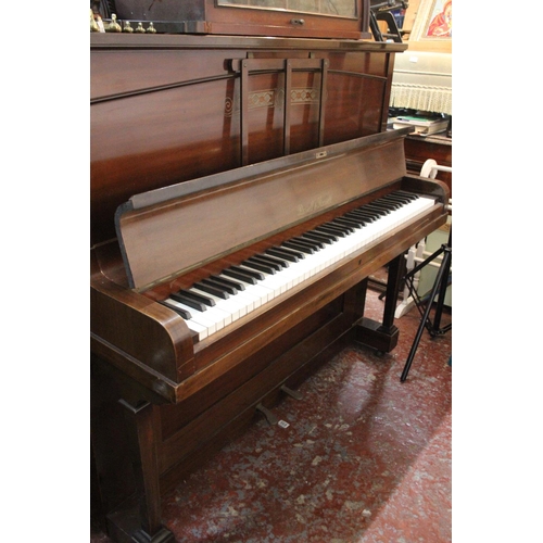 190 - A Russell & Russell upright piano.