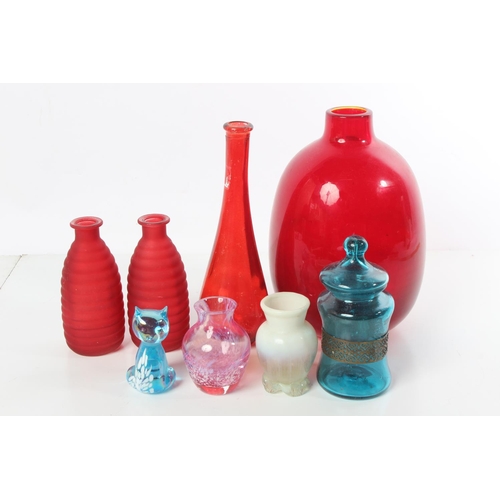 193 - A blue glass cat, an antique cream glass vase and more.