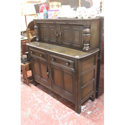 200 - A vintage Ercol sideboard.