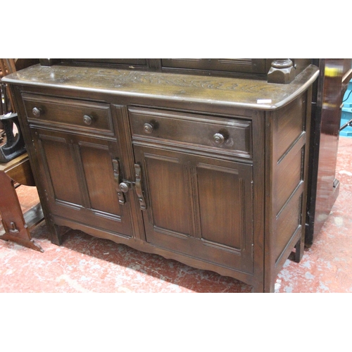 200 - A vintage Ercol sideboard.