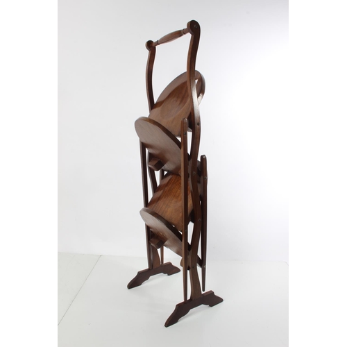 203 - An antique mahogany folding cakestand.