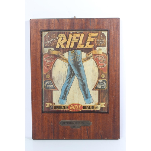 205 - A wooden 'Authorized Rifle Dealer 1981' wall plaque.