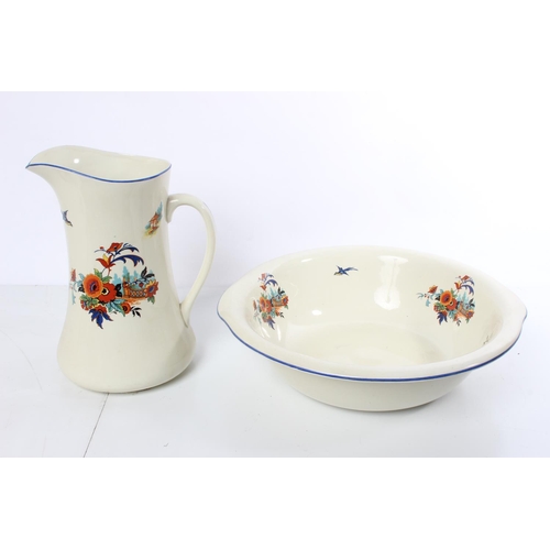 213 - A vintage Empire Ware 'Merry Glaze' jug and basin set, chamber pot and tooth brush holder.