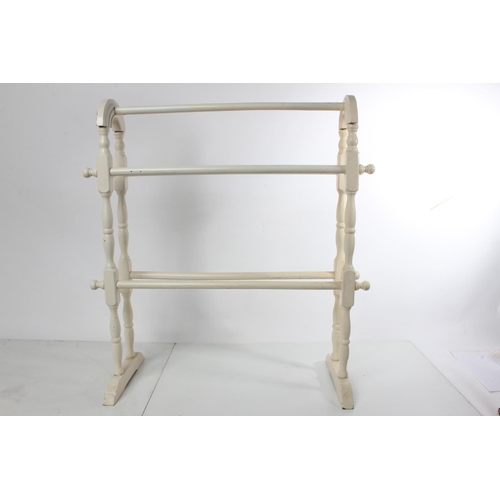 216 - A painted towel rail.