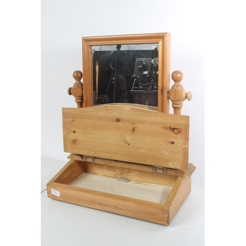 224 - A pine dressing table mirror and storage case.