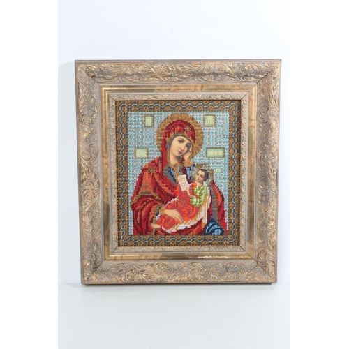 225 - A stunning needlework and bead religious picture.