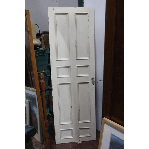 241 - A small antique painted panel door.