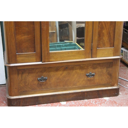 237 - A stunning antique mahogany single mirror door wardrobe and drawer.