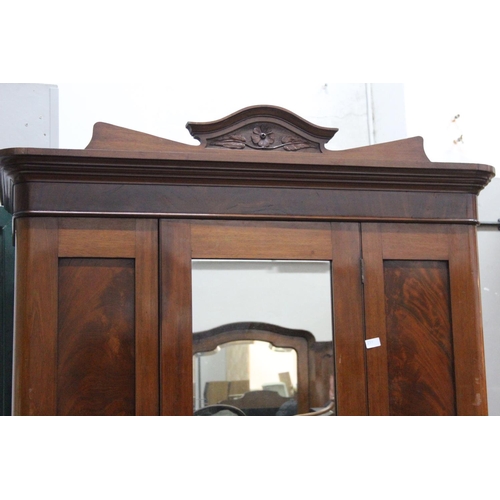 237 - A stunning antique mahogany single mirror door wardrobe and drawer.