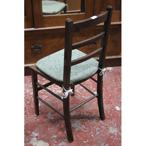 314 - A vintage oak single chair with rattan upholstered seat.