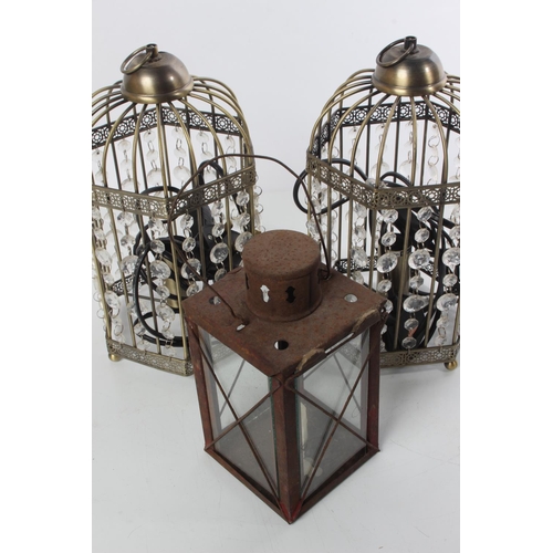 324 - A pair of beaded table lamps and a metal cased lantern.