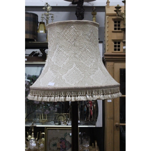 355 - A stunning antique mahogany standard lamp and shade.