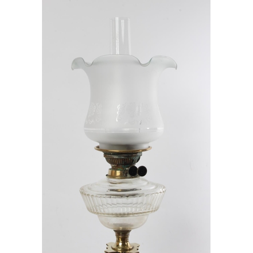 368 - A stunning antique Corinthian pillar oil lamp, with clear glass font and shade.