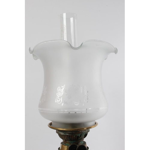 368 - A stunning antique Corinthian pillar oil lamp, with clear glass font and shade.