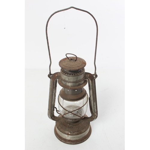 383 - A vintage Feuer Hand hurricane lamp.