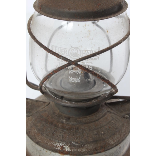 383 - A vintage Feuer Hand hurricane lamp.